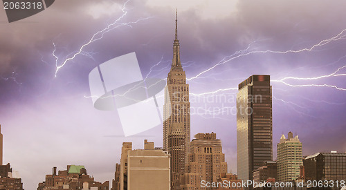 Image of Wonderful view of Manhattan Skyscrapers with beautiful storm col