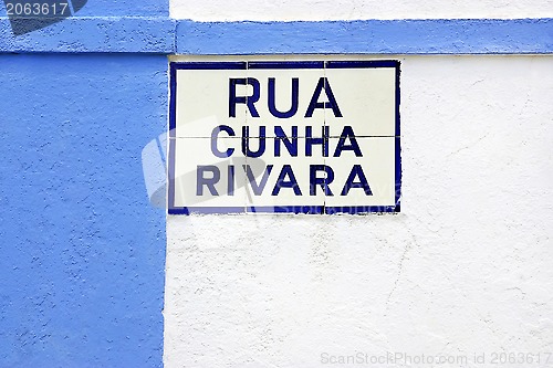 Image of Portuguese tile plaque on blue street