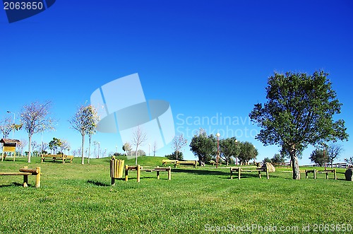 Image of Wooden chairs in portuguese park