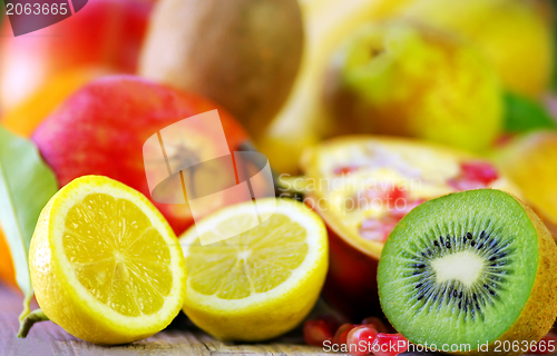 Image of Kiwi , lemon and variety fruits