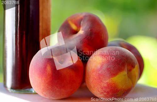Image of Ripe peaches and liquor