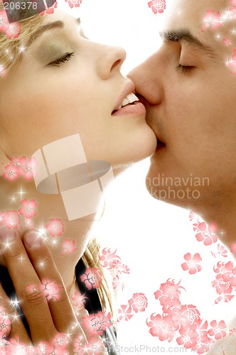 Image of gentle kiss with flowers