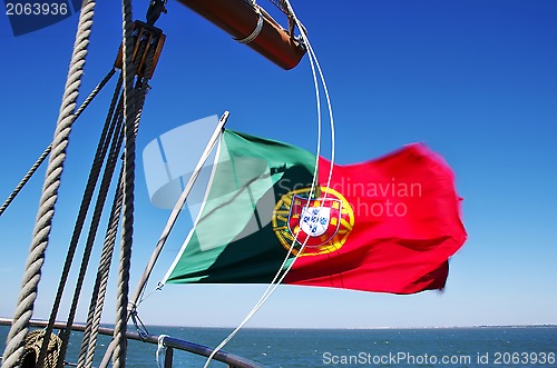 Image of Portuguese flag on sailboat