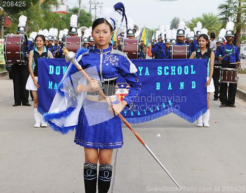 Image of Thai students in a marching band participate in a parade, Phuket