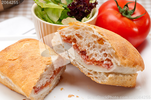 Image of ciabatta panini sandwich with parma ham and tomato