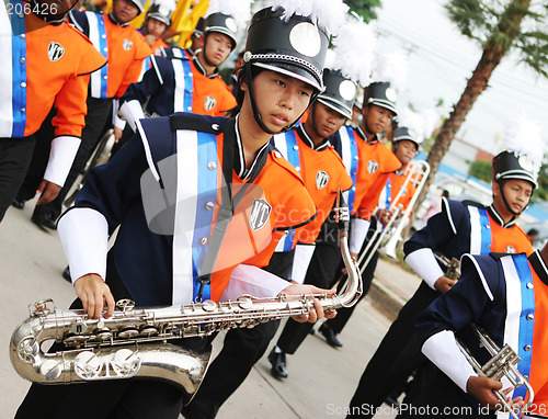 Image of Thai students in a marching band participate in a parade, Phuket