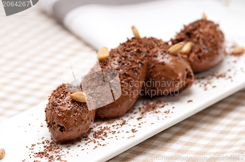 Image of chocolate mousse quenelle dessert