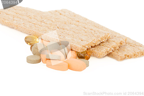 Image of tasty crispbread and tablets