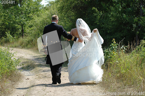 Image of Wedding couple walking