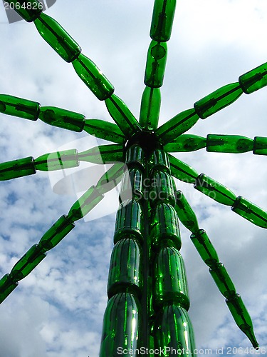 Image of Palm tree made of bottles from a champagne
