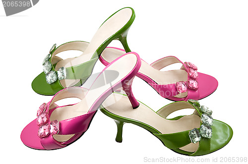 Image of Two pairs pink and green shoes