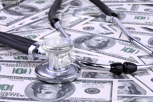 Image of Stethoscope and dollars