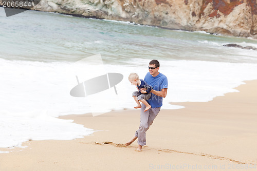Image of father and son at the beach