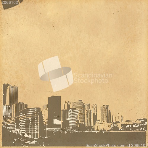 Image of grunge image of cityscape from old paper 