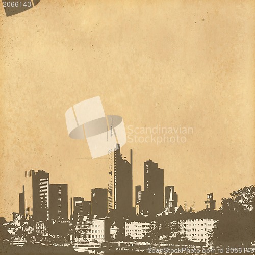 Image of grunge image of cityscape from old paper 