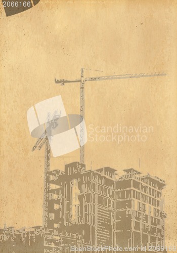 Image of grunge image of cityscape from old paper 