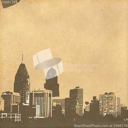 Image of grunge image of cityscape from old paper 