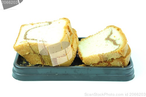 Image of some slices of sponge cake with chocolate chips