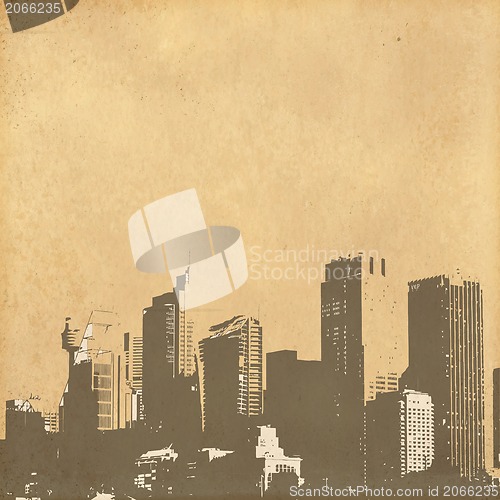 Image of grunge image of cityscape from old paper 