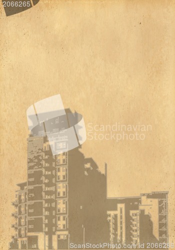 Image of grunge image of cityscape from old paper 