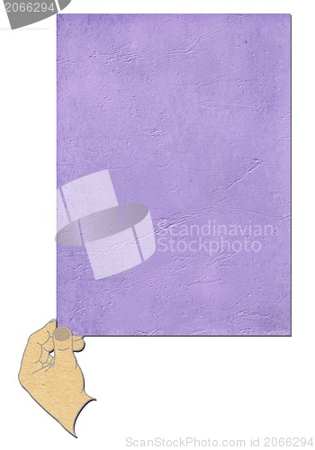 Image of old paper in  hand isolated on white background 