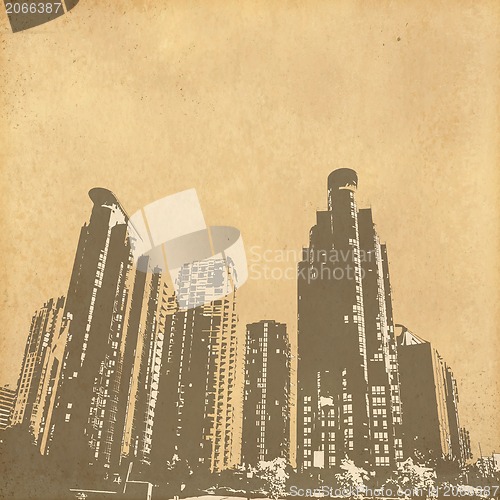 Image of grunge image of cityscape from old paper 