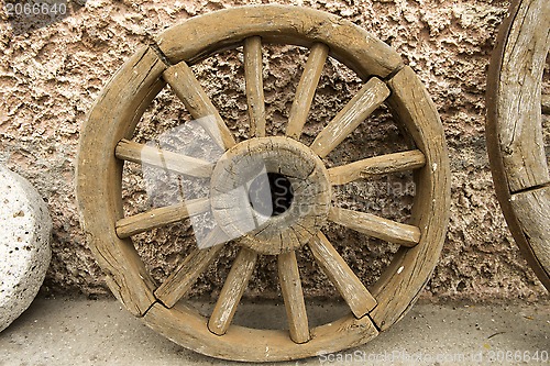 Image of Wooden cart wheel