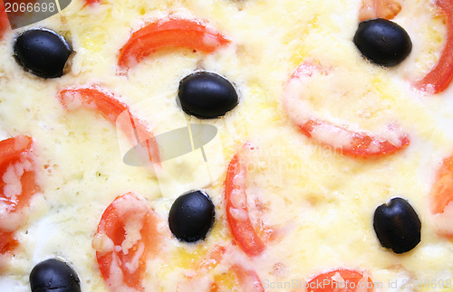 Image of Omelette with tomatoes, black olive and cheese