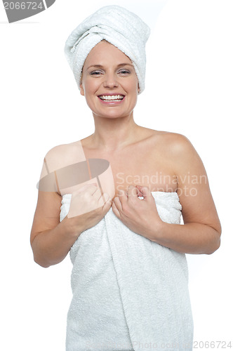 Image of Caucasian woman wrapped in a towel