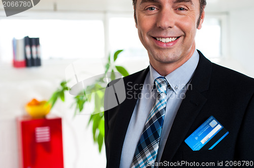 Image of Entrepreneur with credit card in his blazer pocket