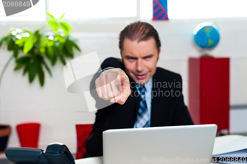Image of Boss pointing his index finger at you