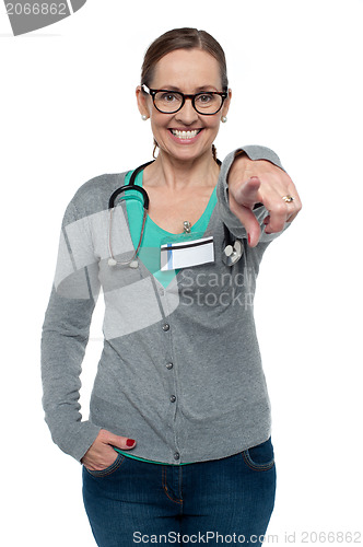 Image of Cheerful medical practitioner pointing at the camera