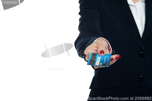 Image of Cropped image of a woman holding credit card