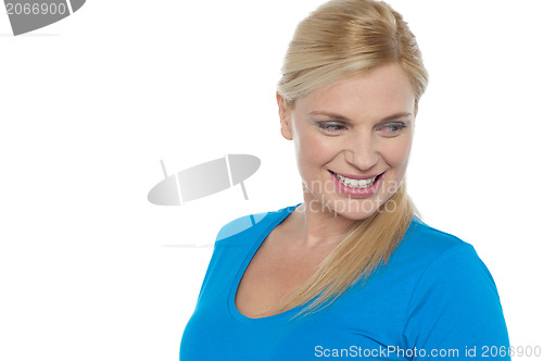 Image of Woman in casuals sharply looking away