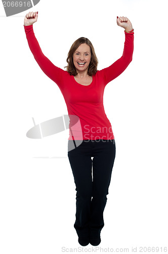 Image of Jubilant lady celebrating her success