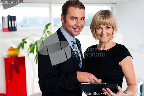 Image of Corporate couple reviewing weekly schedule