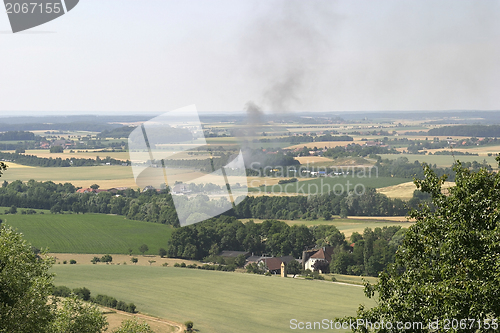 Image of rural scene and fire