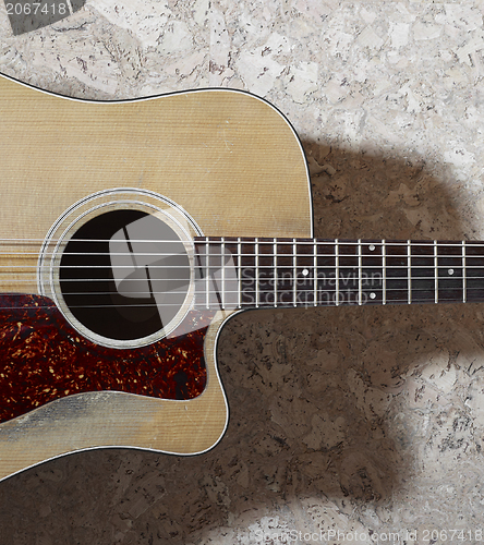 Image of old acoustic guitar