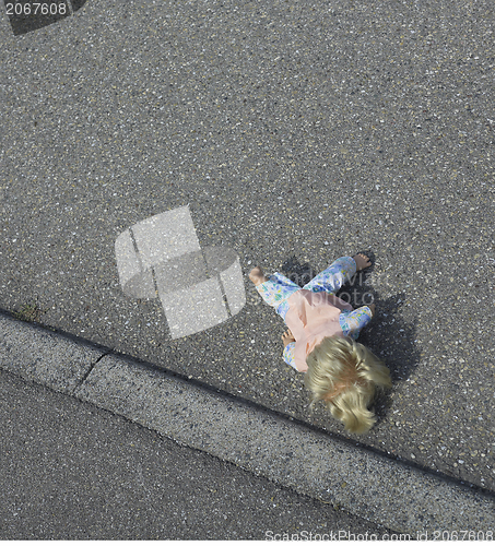 Image of doll on the street