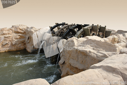 Image of historic water wheel