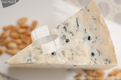 Image of gorgonzola cheese fresh cut and pinenuts