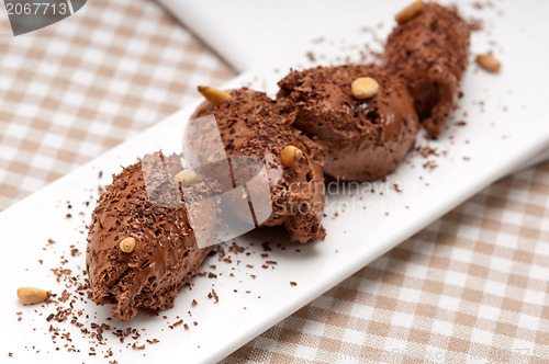 Image of chocolate mousse quenelle dessert