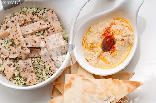 Image of chicken taboulii couscous with hummus