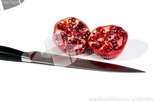 Image of pomegranates and knife