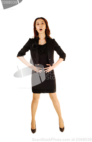 Image of Girl holding her stomach.