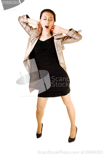 Image of Asian woman in coat.