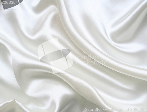 Image of Smooth elegant white silk as background 