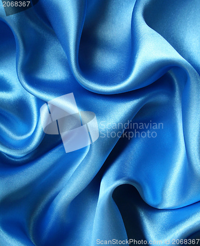 Image of Smooth elegant blue silk as background