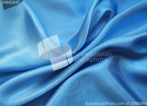 Image of Smooth elegant blue silk as background