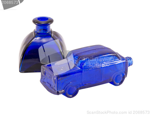 Image of retro glass blue car small alcohol bottle isolated 